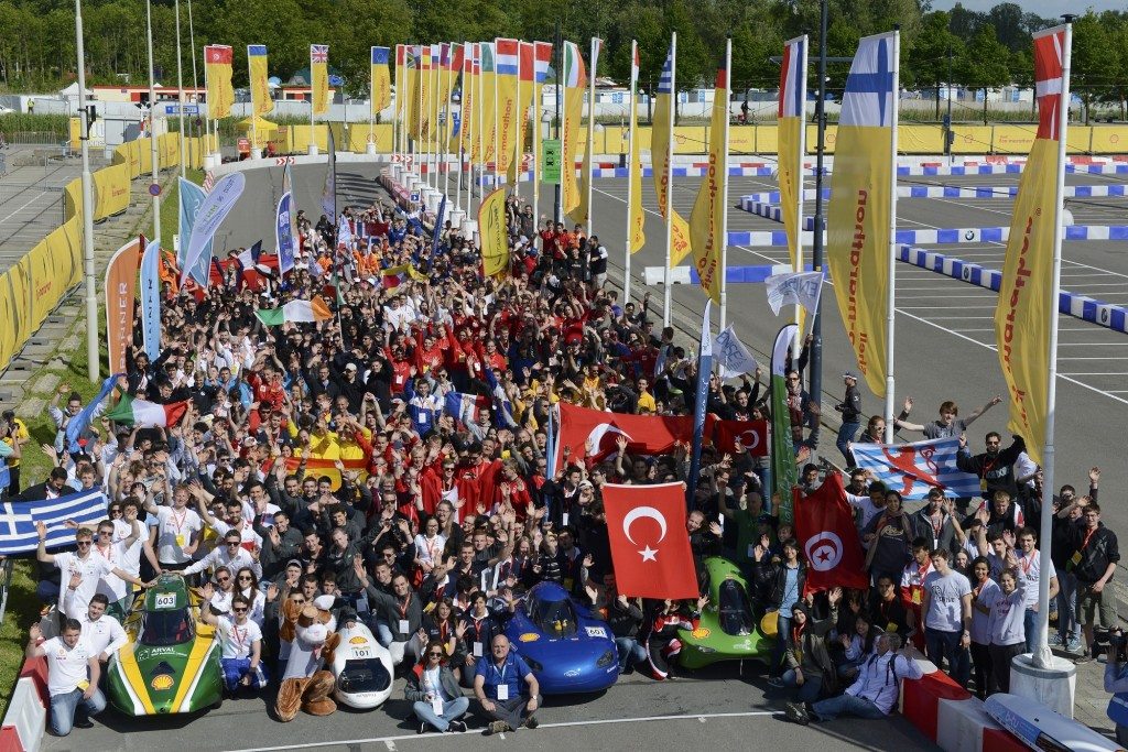 Participants line up for the group photo during practice day 2 of the Shell Eco-marathon Europe 2015 in Rotterdam, Netherlands, Thursday, May 21, 2015. (Patrick Post/AP Images for Shell)